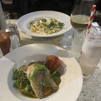 Mourne Seafood Bar - Top: Risotto "kedgeree" Bottom: Pan fried seabass - Seafood Near Me - Belfast, BFS Mourne Seafood Bar - Top: Risotto "kedgeree" Bottom: Pan fried seabass - Seafood Near Me - Belfast, BFS