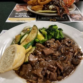 Metro Diner - Beef tips with zucchini and squash (front) Burger and onion rings (back) - American Near Me - Matthews, North Carolina Metro Diner - Beef tips with zucchini and squash (front) Burger and onion rings (back) - American Near Me - Matthews, North Carolina