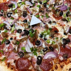 Main Street Pizza - This Large combo pizza was under $25 on March 12, 2025 (with tax.)