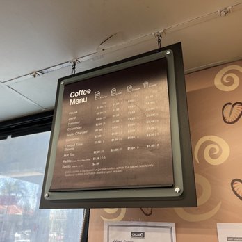 Circle K - a coffee menu displayed on a wall - Gas Stations Near Me - Moreno Valley, California