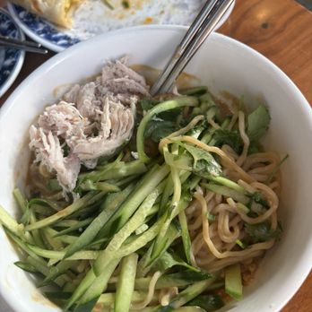 Joy - Dan Dan Noodles $12.50 Sesame-peanut sauce, chili oil, cucumbers, and crushed peanuts. Served with thin wheat-based noodles & chicken. - Taiwanese Near Me - Los Angeles, California