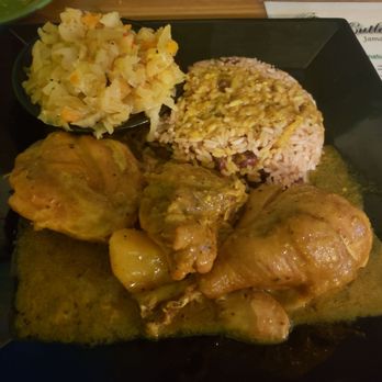 Cutlass Grille - Curried chicken kidney beans and rice and cabbage - Caribbean Near Me - Chesapeake, Virginia