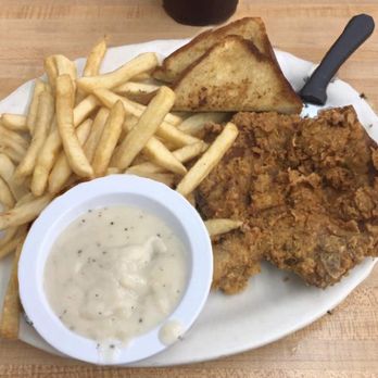 Honey Hole Cafe - Fried pork chop with french fries and gravy.  Scrumptious! - American Near Me - Marshall, Texas