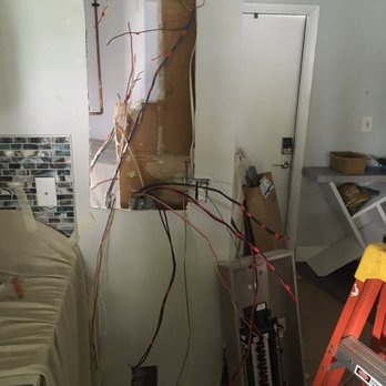 Mister Sparky - Work in progress  New panel location on same wall but opposite side. - Electricians Near Me - Pompano Beach, Florida