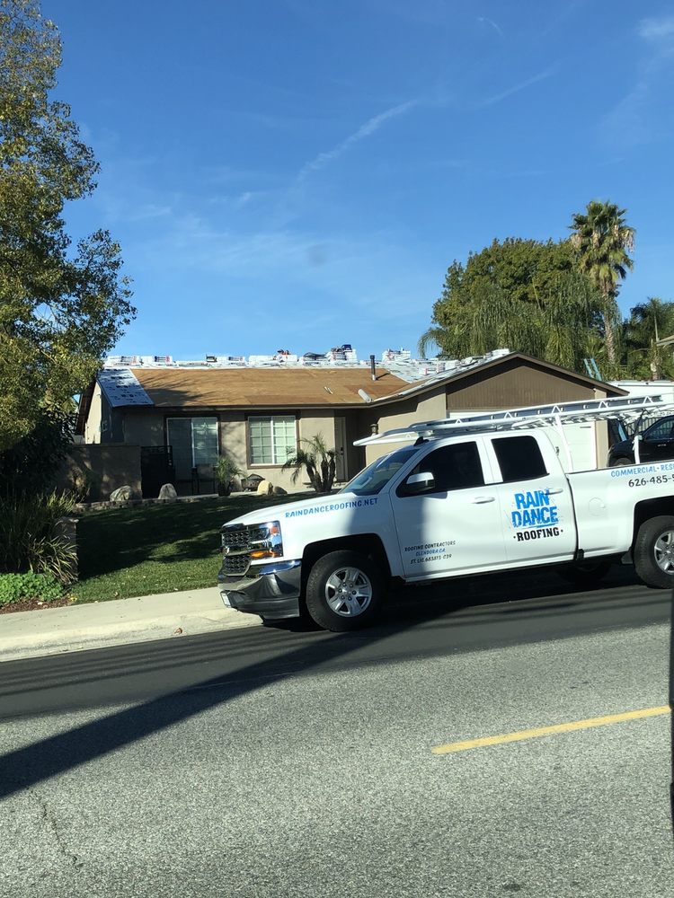 Slide of Rain Dance Roofing