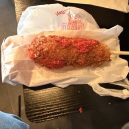 Hot Cheeto corn dog not coated at all but still very tasty Hot Cheeto corn dog not coated at all but still very tasty