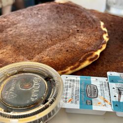 Blu Island Bistro - Two pancakes with maple syrup
