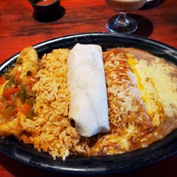 Sagebrush Cantina - #4 with chile releno, rice, beef burrito, chicken enchilada , and refried beans. It was enough for two meals.