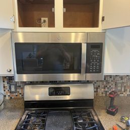 Installed over the range microwave with electrical outlet above. Installed over the range microwave with electrical outlet above.