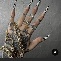 CLASSY Nails And Spa - Design, shape, and length I requested with gems added vs what I got.