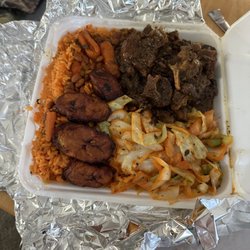 Messy Me - Large oxtail platter with rice, plantains, and cabbage.