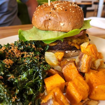 True Food Kitchen - Double vegan burger, sweet potato side and crispy kale. - New American Near Me - Hackensack, New Jersey True Food Kitchen - Double vegan burger, sweet potato side and crispy kale. - New American Near Me - Hackensack, New Jersey