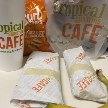 Tropical Smoothie Cafe - Smoothie  Buffalo chicken wrap  And walnut flat bread I didn't even order I was suppose to have a chicken quesadilla.... - Juice Bars & Smoothies Near Me - Cary, North Carolina