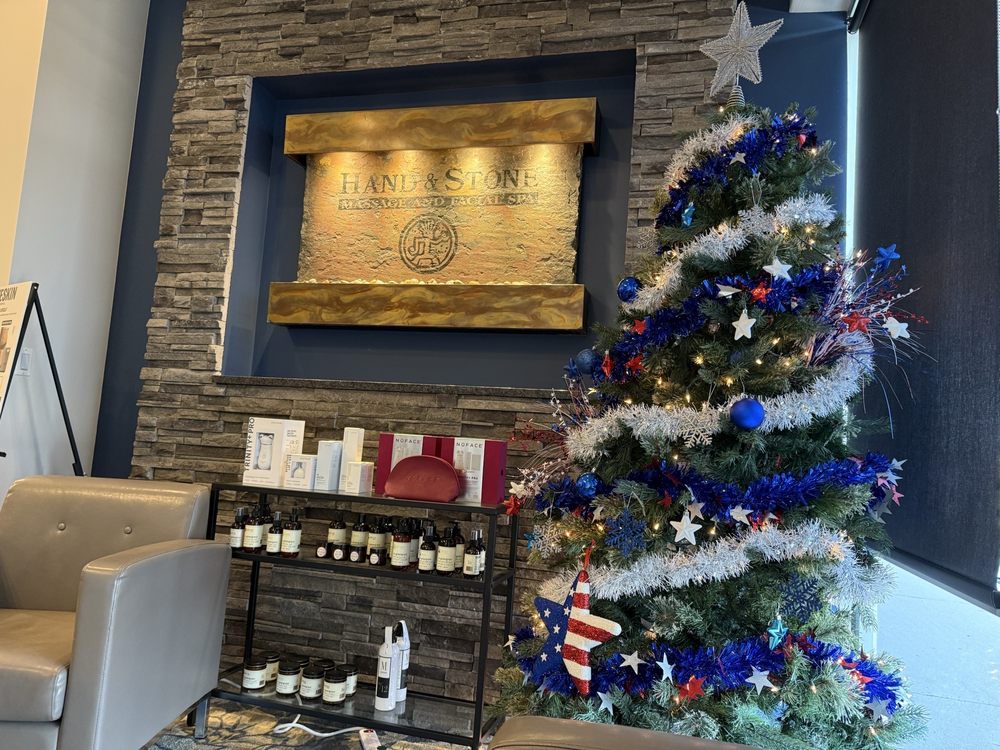 Hand & Stone Massage and Facial Spa Logo