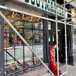 Bootmaster - Frontage, under temporary scaffolding, September 2026