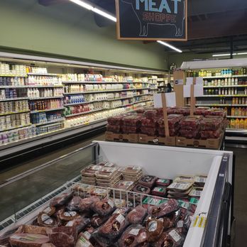 Berkeley Bowl Marketplace - Prepackaged meat with dairy in background - Grocery Near Me - Berkeley, California