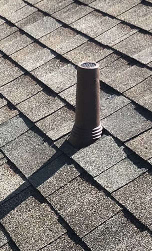 Slide of Menzel Roofing Services