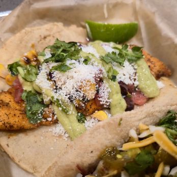 Torchy's Tacos - Mr. Orange salmon taco - $6.70 - Tacos Near Me - Orlando, Florida