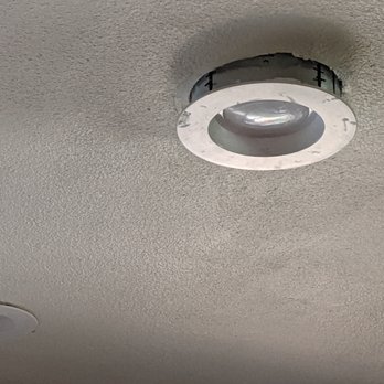 P Howard Construction - a white ceiling with a round light fixture - General Contractors Near Me - Anaheim Hills, California