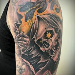 Paradise City Tattoo - Reaper on fire done by Vinnie Stones at Paradise City Tattoo