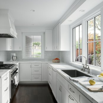 Calder Custom - a clean kitchen with white cabinets - General Contractors Near Me Calder Custom - a clean kitchen with white cabinets - General Contractors Near Me