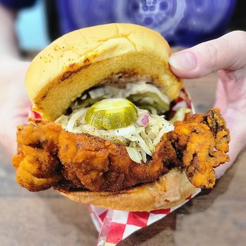 Wooboi Hot Chicken - Sando sandwich has breaded chicken breast filet, ciderslaw, butter pickles, and comeback sauce in a potato bun. - Chicken Shop Near Me - Alexandria, Virginia Wooboi Hot Chicken - Sando sandwich has breaded chicken breast filet, ciderslaw, butter pickles, and comeback sauce in a potato bun. - Chicken Shop Near Me - Alexandria, Virginia