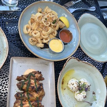 Taverna Veranda - Calamari, chicken wings, spicy feta - Mediterranean Near Me - Edgewater, New Jersey Taverna Veranda - Calamari, chicken wings, spicy feta - Mediterranean Near Me - Edgewater, New Jersey