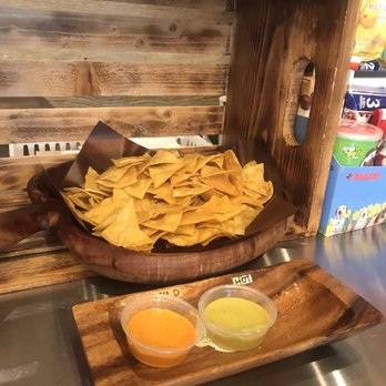 Ay Caramba, Eh - Complimentary chips and sauce by counter - Mexican Near Me - Vaughan, Ontario