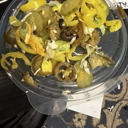 Subway - i ordered my salad with No pickles, jalapeños or bell peppers, or yellow peppers.  but this is what was in my salad.  yuck