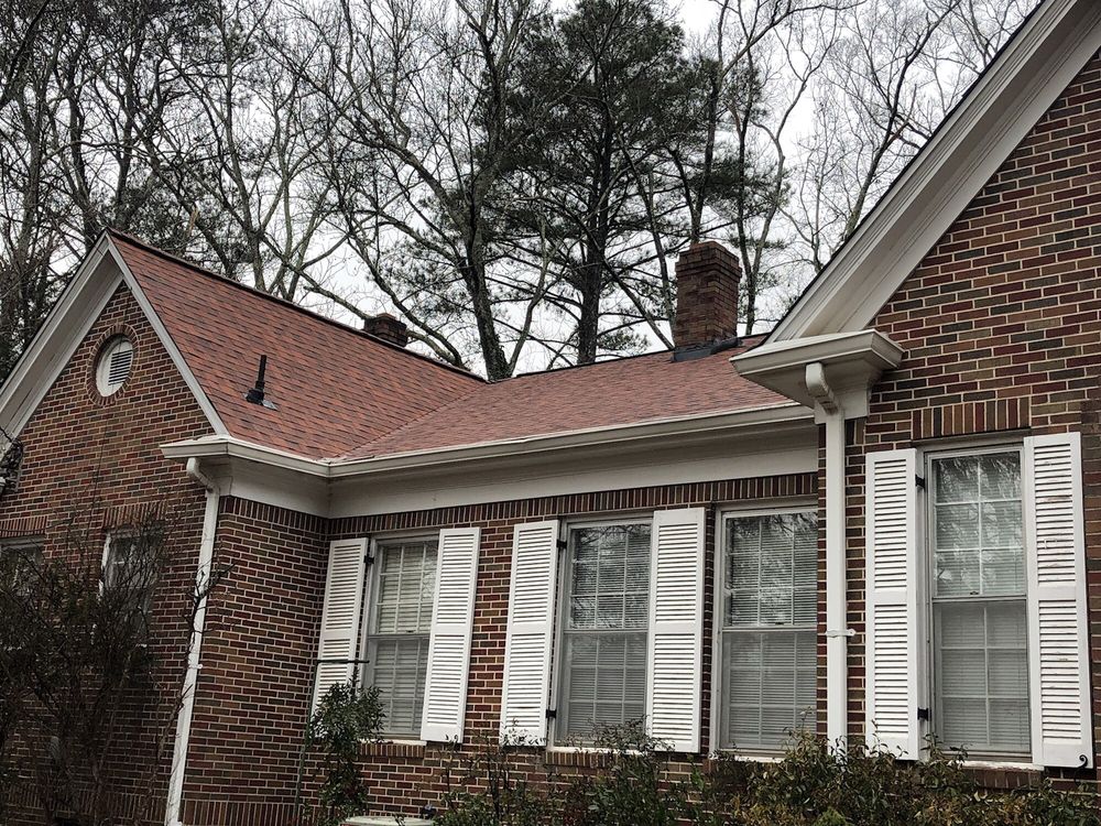 Slide of Rainblocker Roofing & Construction