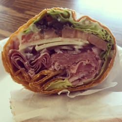 Freshco - Italian combo sandwich - ham salami provolone olives LTO on a spinach wrap