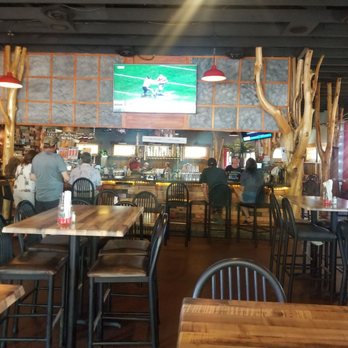 The Woods Restaurant and Bar - people sitting at tables - Bars Near Me - Brainerd, Minnesota