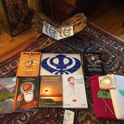 Sacha Sauda Gurmat Parchar Society - We got all this wonderful stuff! Book holder, Ek ong kar and Sikh symbol stickers, 6 books, two turbans