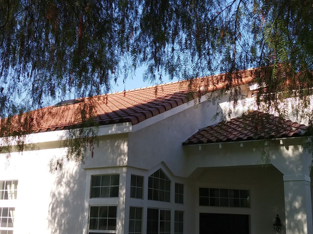 Slide of Freeman and Sons Roofing