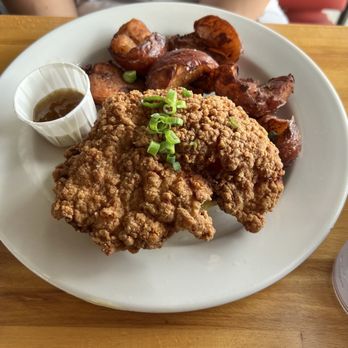 Phoebe's Diner - Fried Chicken Biscuit On top of an over-easy egg and biscuit - Breakfast & Brunch Near Me - Austin, Texas