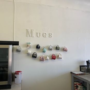 Parma Nutrition - a wall of mugs hanging on the wall - Health Markets Near Me - Parma Heights, Ohio