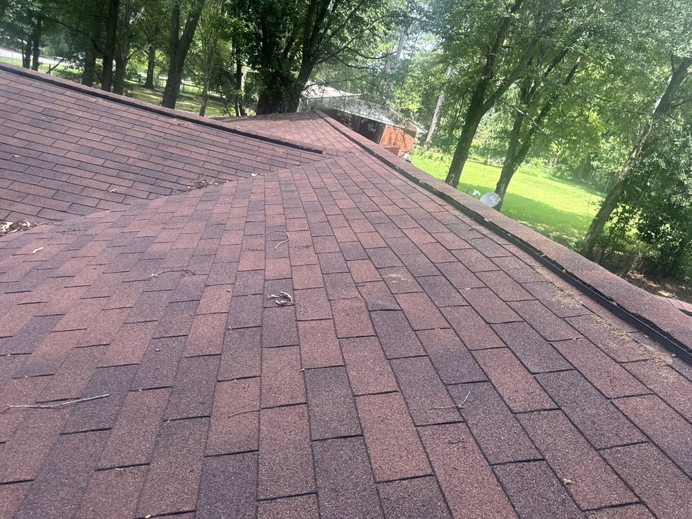 Slide of Mosaic Roofing Company