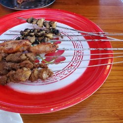 Tasty BBQ & Beer Bar - Lamb skewers $11.88 for 6 skewers; Chicken wing $8.94 for 3 skewers, and Sea Conch Meet $9.12 for 4 skewers