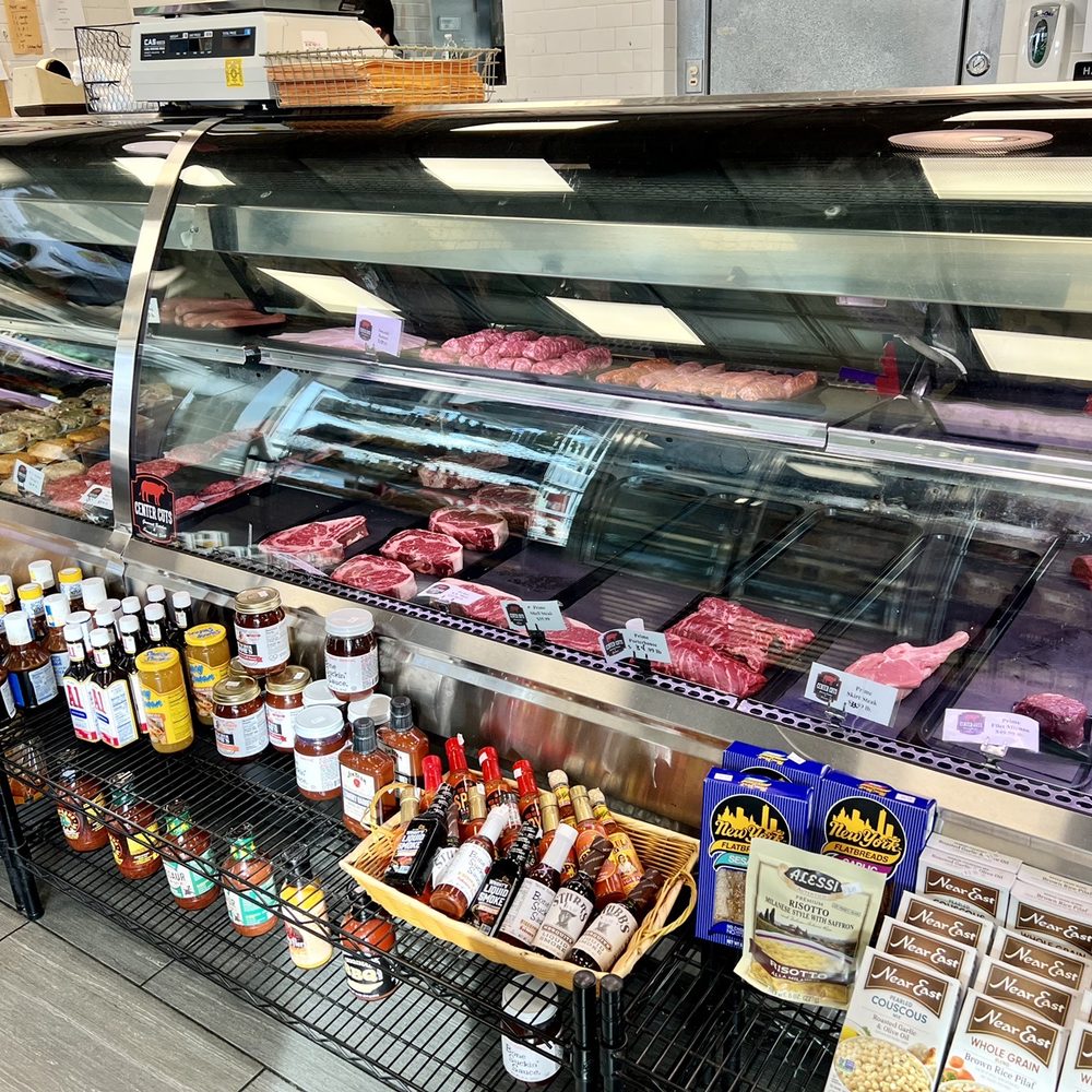 Center Cuts - a display of meats and condiments - Butcher Near Me - Roslyn Heights, New York Center Cuts - a display of meats and condiments - Butcher Near Me - Roslyn Heights, New York