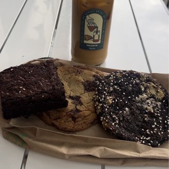 Hearth Bakery - Coffee with a chocolate chip cookie, brownie, and sesame cookie - Bakeries Near Me - Denver, Colorado