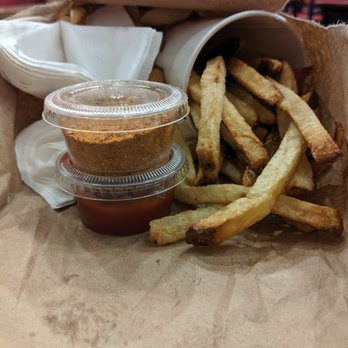 Five Guys - fries, side of cajun spice, and ketchup - Burgers Near Me - San Jose, California