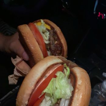 In-N-Out Burger - Left side is hamburger with grilled onions with cheese and right side is hamburger with raw onions. - Burgers Near Me - Huntington Beach, California In-N-Out Burger - Left side is hamburger with grilled onions with cheese and right side is hamburger with raw onions. - Burgers Near Me - Huntington Beach, California