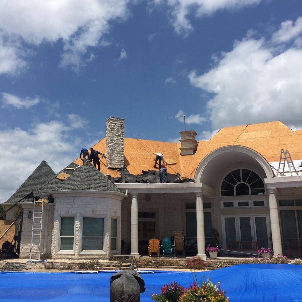 Slide of Blue Nail Roofing & Construction