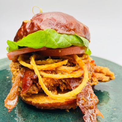 Photo of Bay Pointe Bar & Grille - Shelbyville, MI, US. a burger on a plate