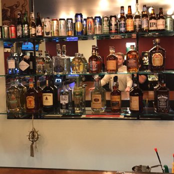 Spyro's Gyros - a man behind a bar counter - Pool Halls Near Me - Bridgton, Maine