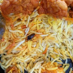 Ruchi Indian Restaurant - Cockroach in Takeout order of Veg 65 Biryani