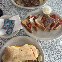 Two Fresh Eggs Sausage Biscuits Home Fries French Toast Uptown Walking Sandwich Two Fresh Eggs Sausage Biscuits Home Fries French Toast Uptown Walking Sandwich