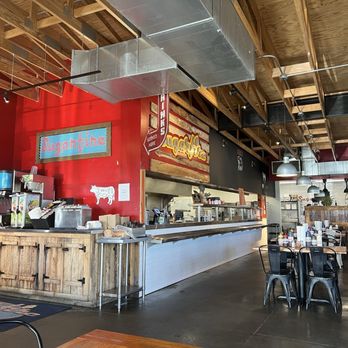 Sugarfire - Inside with nice serving area where u can see the magic - Smokehouse Near Me - O'Fallon, Illinois