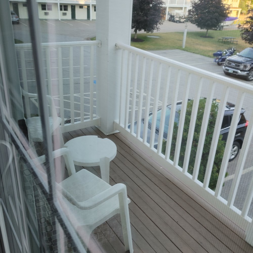 Golden Gables Inn - Balcony with chairs - Hotels Near Me - North Conway, New Hampshire Golden Gables Inn - Balcony with chairs - Hotels Near Me - North Conway, New Hampshire