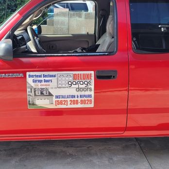 Deluxe Garage Doors - Deluxe garage doors sign and truck - Garage Door Services Near Me - Bellflower, California Deluxe Garage Doors - Deluxe garage doors sign and truck - Garage Door Services Near Me - Bellflower, California